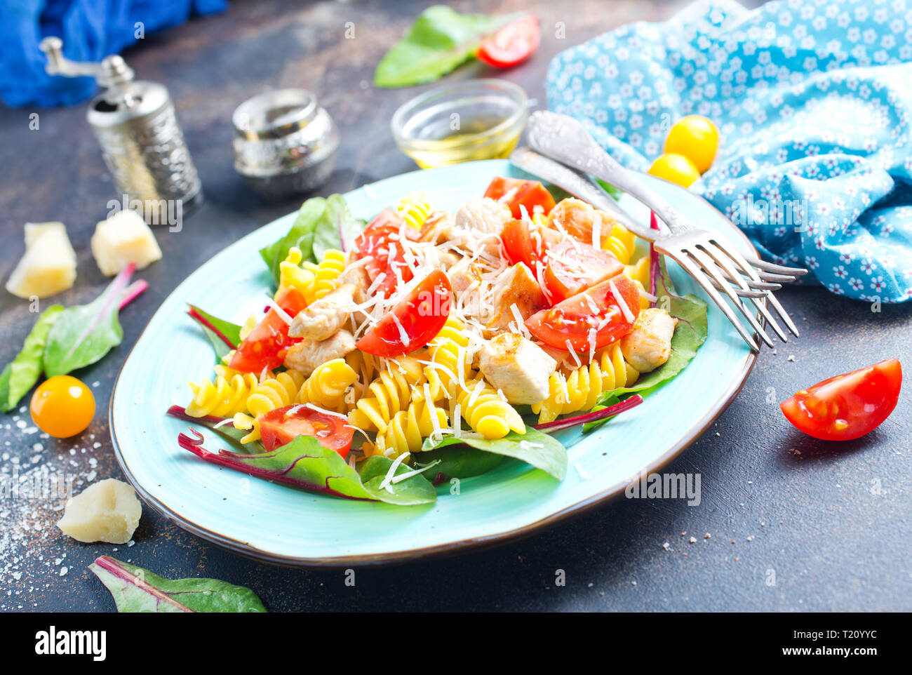 boiled pasta with chicken and gresh tomato Stock Photo