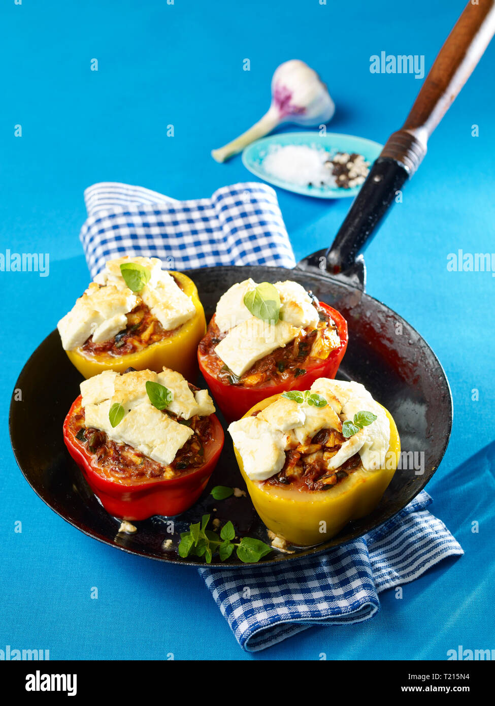 Stuffed bell peppers in pan Stock Photo Alamy