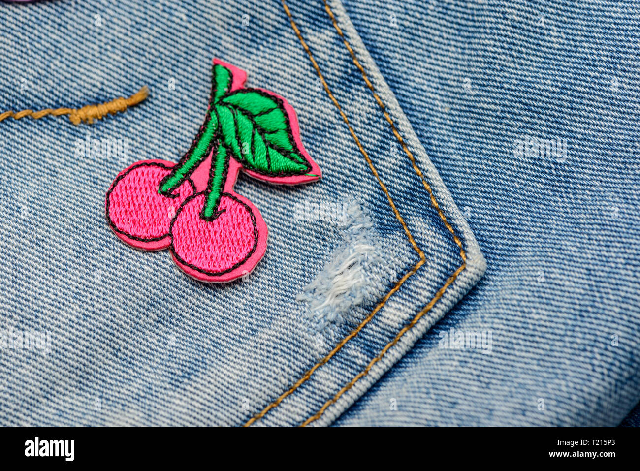 Pink cherries embroidered patch Stock Photo