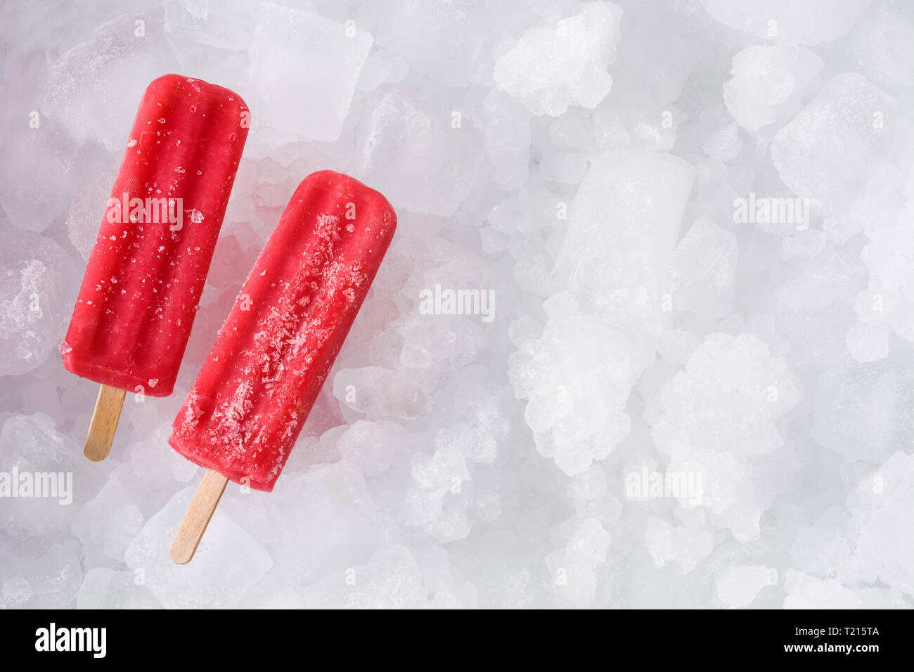 Strawberry popsicles on ice cubes. Top view. Copyspace Stock Photo Alamy