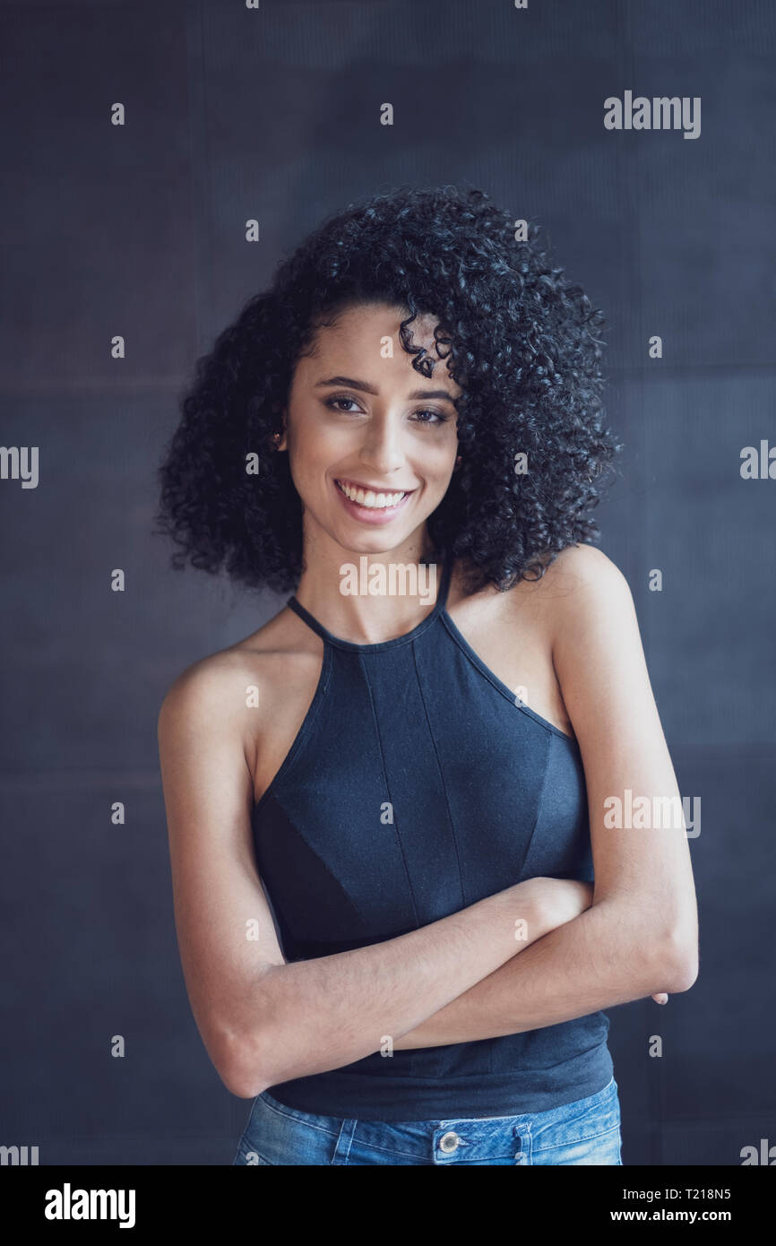 https://c8.alamy.com/comp/T218N5/portrait-of-a-beautiful-young-afro-latin-american-woman-T218N5.jpg