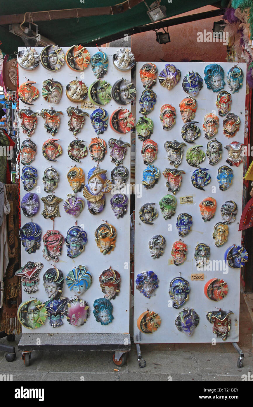 Venice, Italy - July 09, 2011: Many Colorful Venetian Style Masks Souvenirs in Venice, Italy. Stock Photo