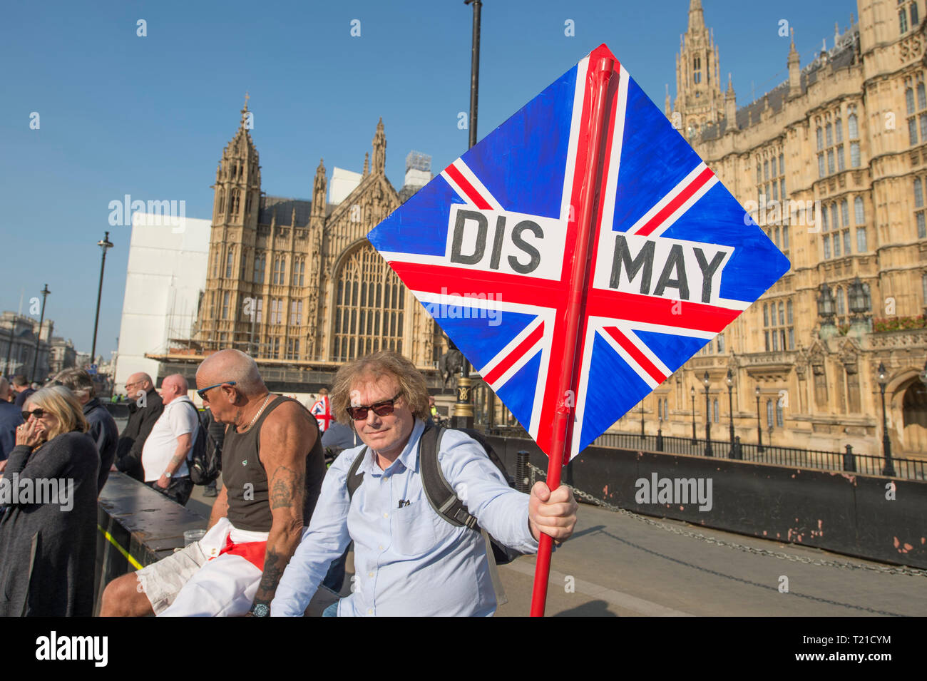 Westminster London, UK. 29 March, 2019. Thousands of Leave supporters gather outside Parliament as MPs reject the Prime Minister’s withdrawal deal by 58 votes. March to Leave rally gathers in Parliament Square to hear Nigel Farage speak. A separate Make Brexit Happen rally takes place in Whitehall, organised by UKIP with EDL’s Tommy Robinson. Credit: Malcolm Park/Alamy Live News. Stock Photo