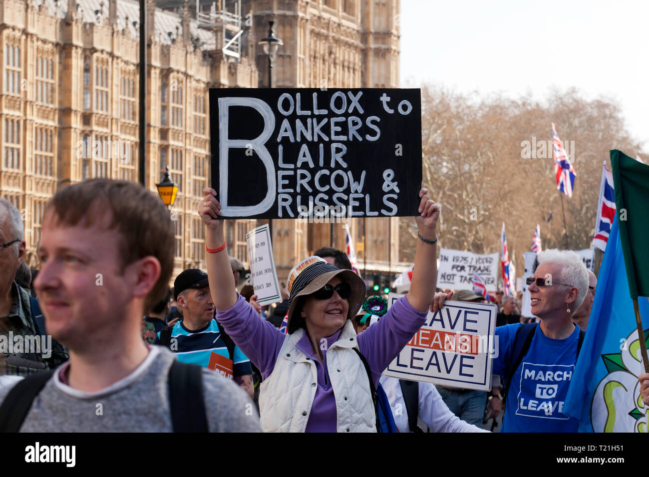 Protestors marching by the Houses of Parliament to demonstrate against the delay to Brexit on the day the UK should have left the EU Stock Photo