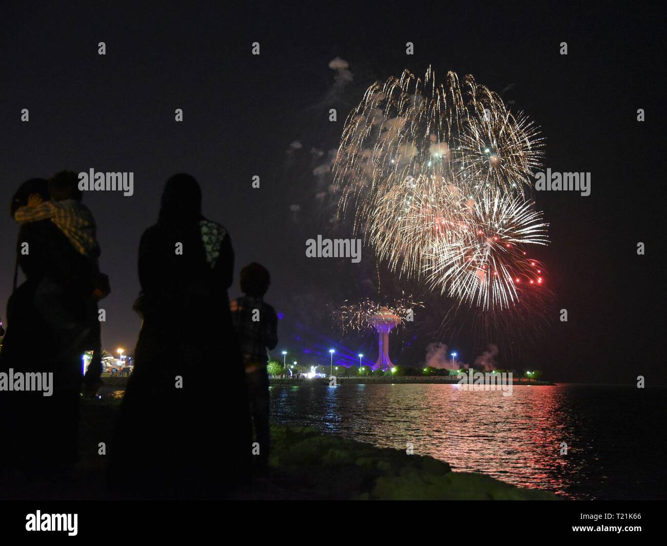Khobar. 29th Mar, 2019. Visitors take pictures of fireworks during the Sharqiah Season by the Al-Khobar corniche in Eastern Province of Saudi Arabia, March 29, 2019. The Sharqiah Season, held in nine cities in Eastern Province, wrapped up on March 30. Over the period of 17 days, the season entailed a carefully crafted selection of over 100 programs and activities covering culture, sports, education and entertainment. Credit: Tu Yifan/Xinhua/Alamy Live News Stock Photo