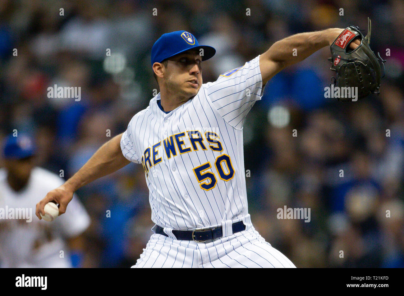 Milwaukee, WI, USA. 29th Mar, 2019. Milwaukee Brewers relief pitcher Jacob Barnes #50 delivers a pitch in relief during the Major League Baseball game between the Milwaukee Brewers and the St. Louis Cardinals at Miller Park in Milwaukee, WI. John Fisher/CSM/Alamy Live News Stock Photo