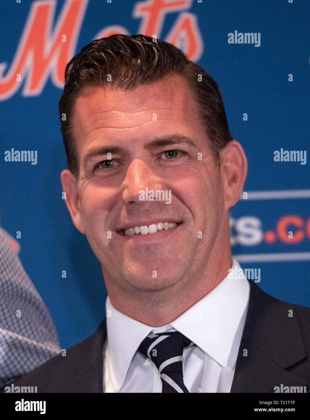 New York Mets Executive Vice President and General Manager Brodie Van  Wagenen appears with Mets starting pitcher Jacob deGrom (48) at a press  conference on his new five-year contract extension at the Ritz-Carlton  Hotel in Arlington, Virginia on ...