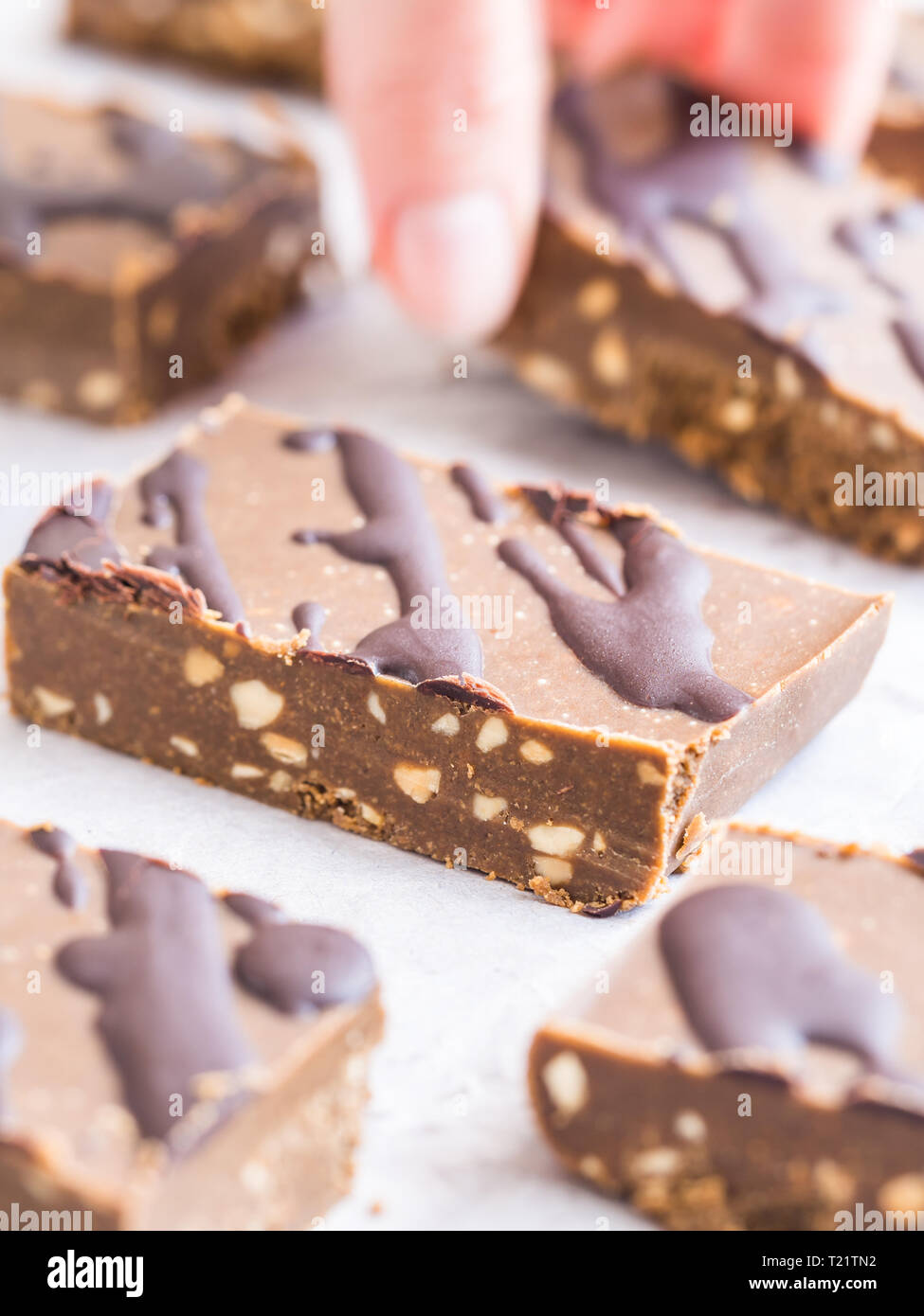 Homemade protein no sugar bars with peanut butter and hemp protein (vegan). Stock Photo
