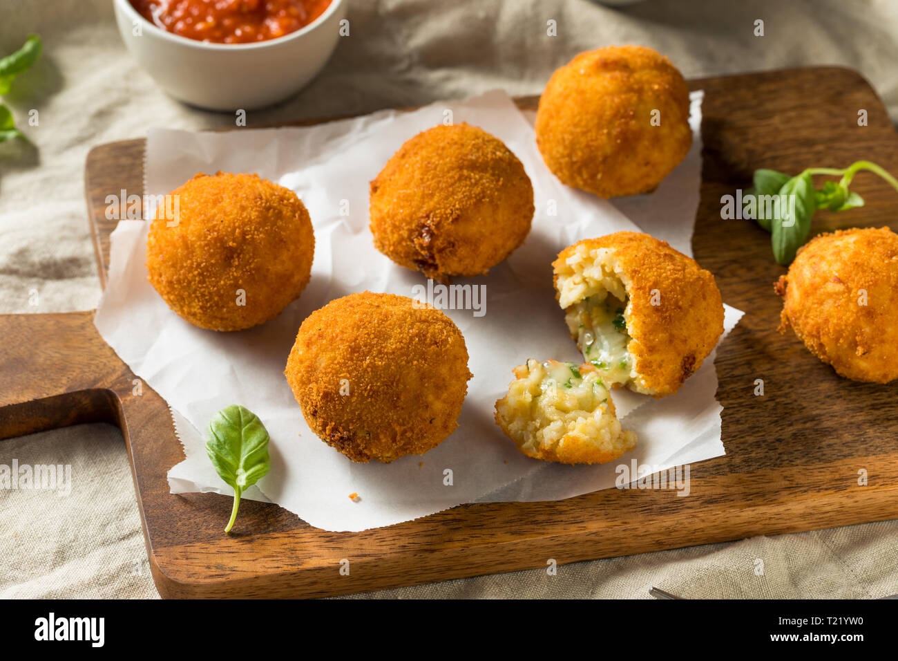 Homemade Deep Fried Risotto Arancini with Basil and Marinara Stock Photo Alamy