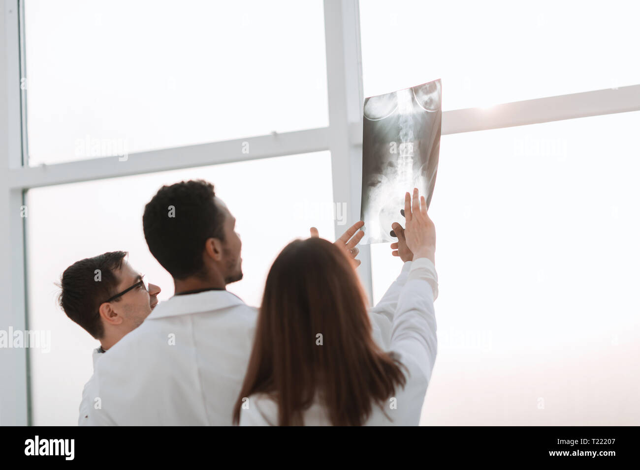 Rear view group doctors hi-res stock photography and images - Alamy