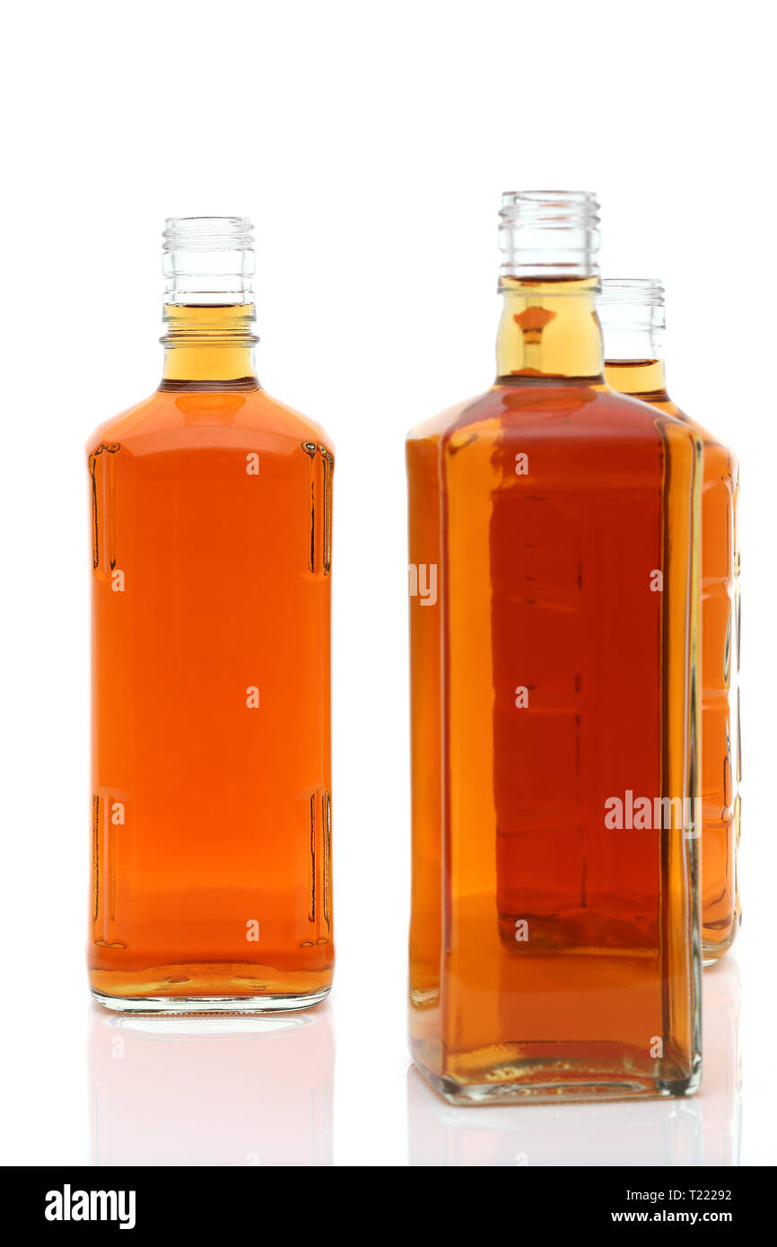 Glass bottle of whiskey on a white background Stock Photo Alamy