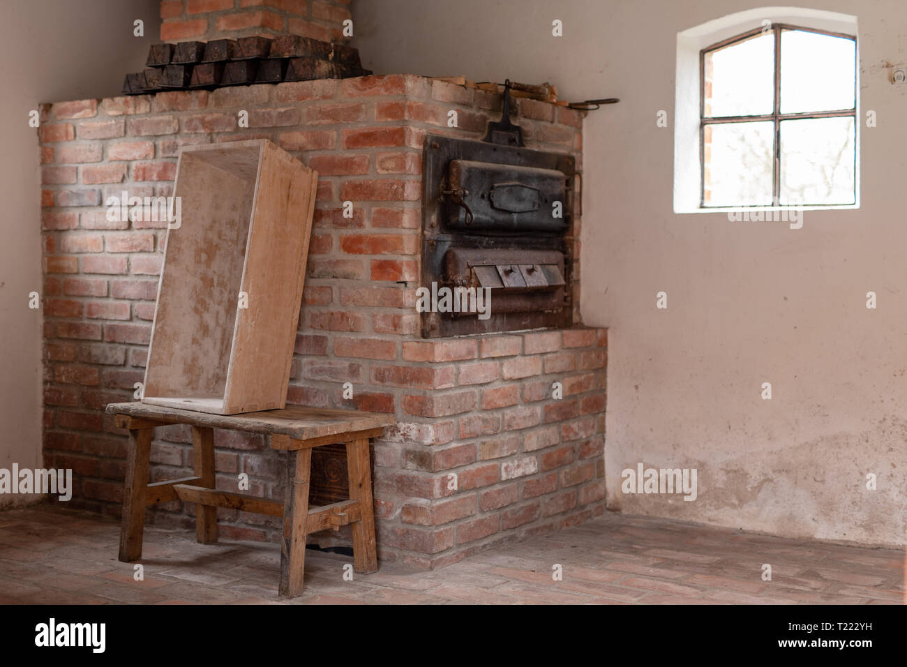 Old bread oven. A room for baking bread on the farm. Light background