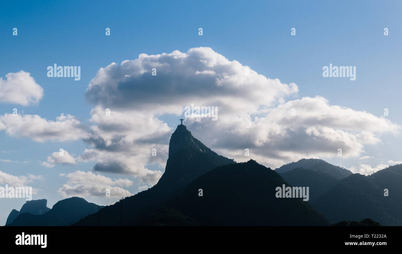 Dramatic view of Christ The Redeemer Statue on Corcovado Hill, Rio de Janeiro, Brazil - UNESCO World Heritage Site. Stock Photo