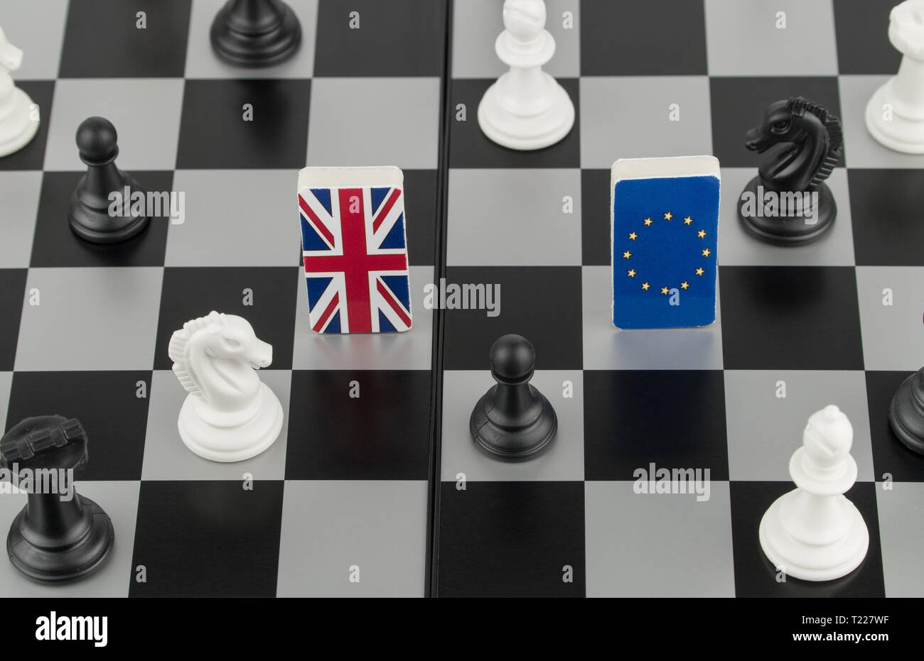 Chess pieces and flags of European Union and Britain on the chessboard