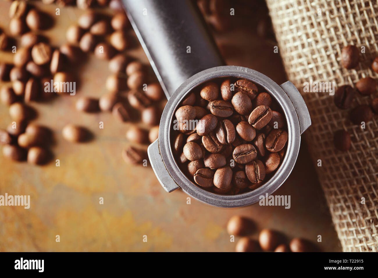 Espresso coffee machine handle with coffee beans Stock Photo