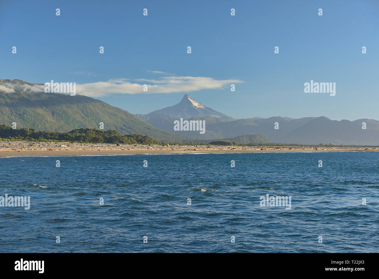 View of Corcovado Volcano across the bay from Chaiten, Patagonia, Region de los Lagos, Chile Stock Photo