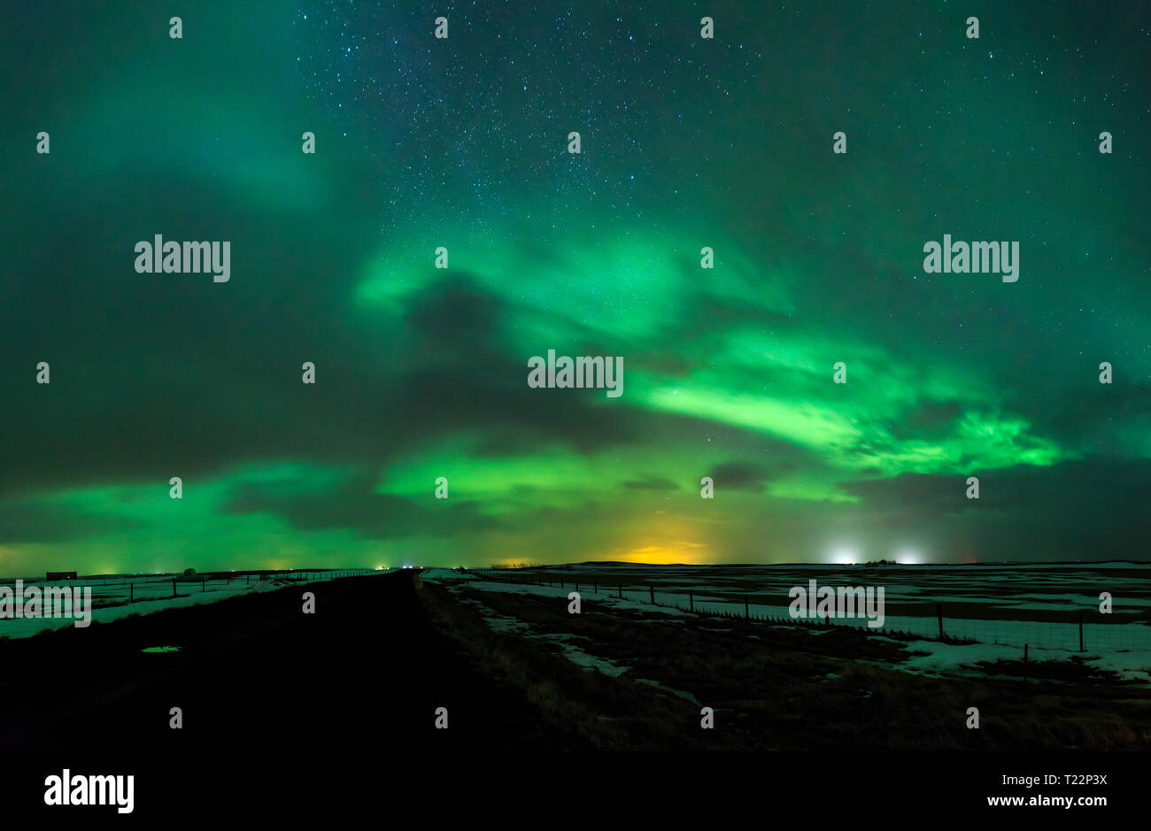 Northern lights Aurora Borealis above a road in Iceland Stock Photo - Alamy