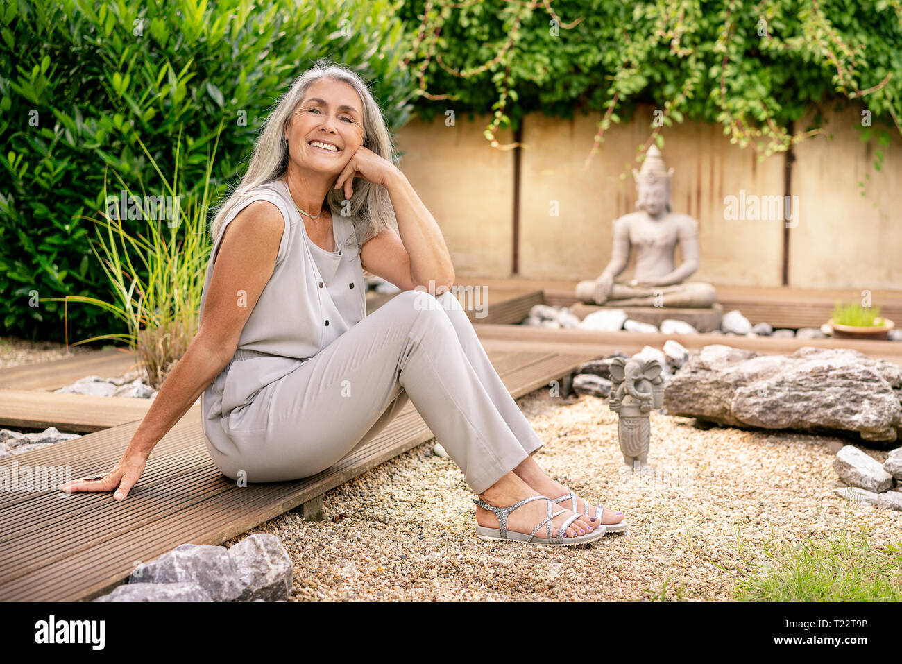 Woman and long hair grey hair hi-res stock photography and images - Alamy