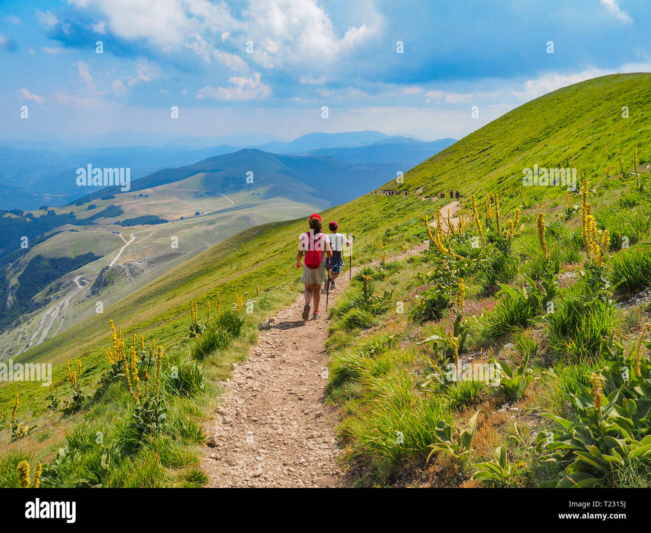 Italy, Umbria, Sibillini mountains, two children hiking mount Vettore Stock Photo