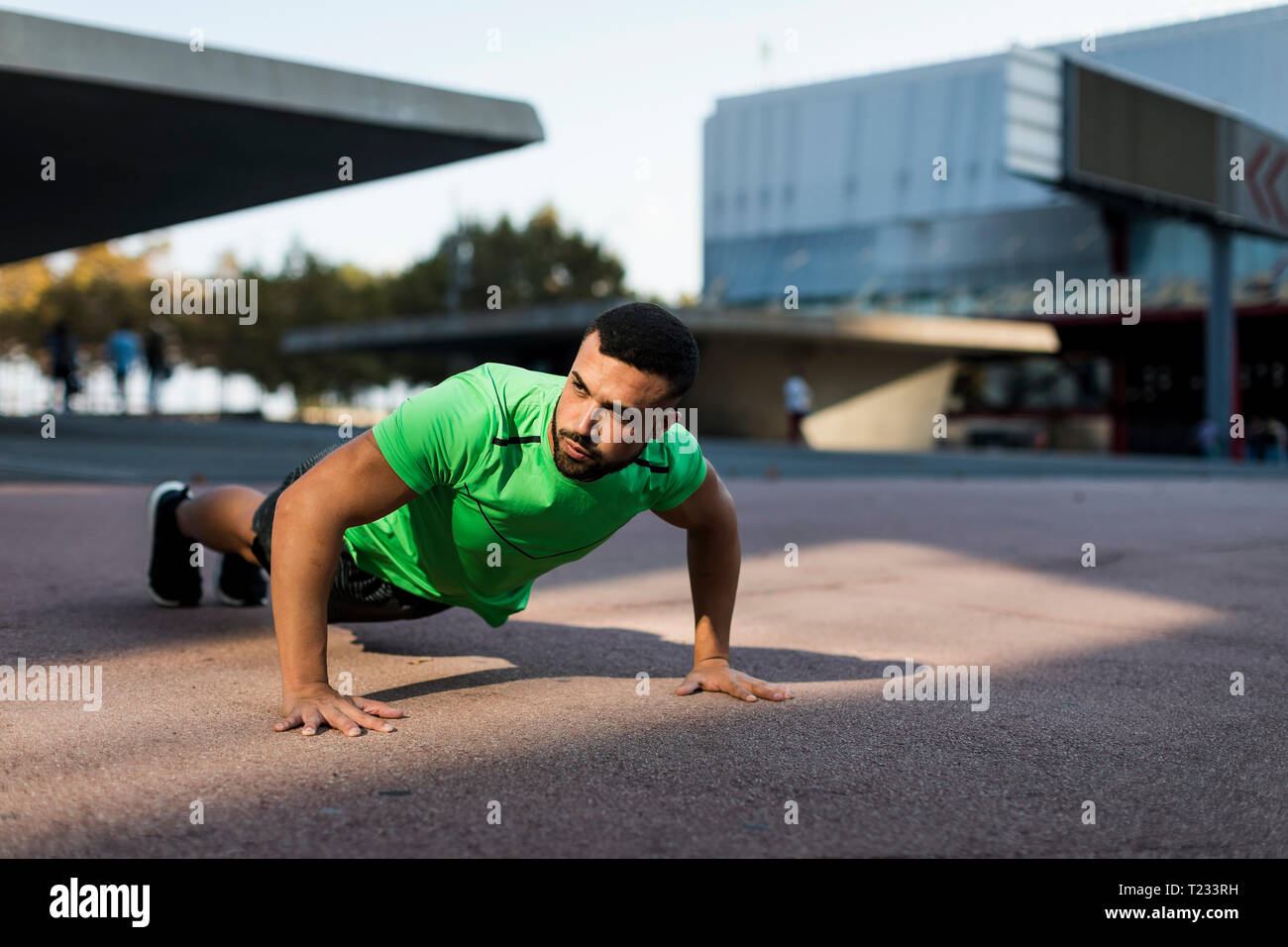 Sportive man during workout, pushup Stock Photo