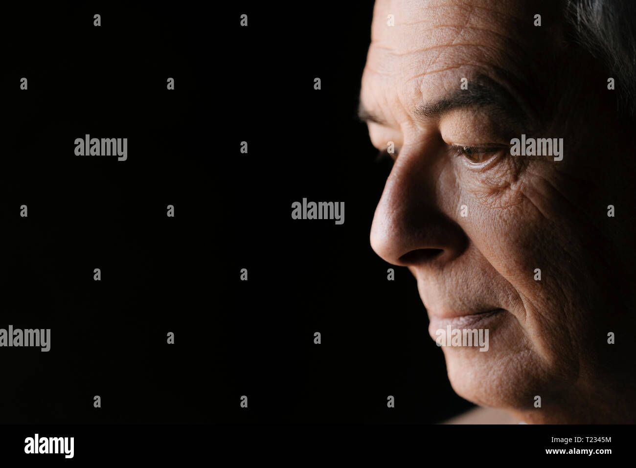 Close-up of serious senior man Stock Photo