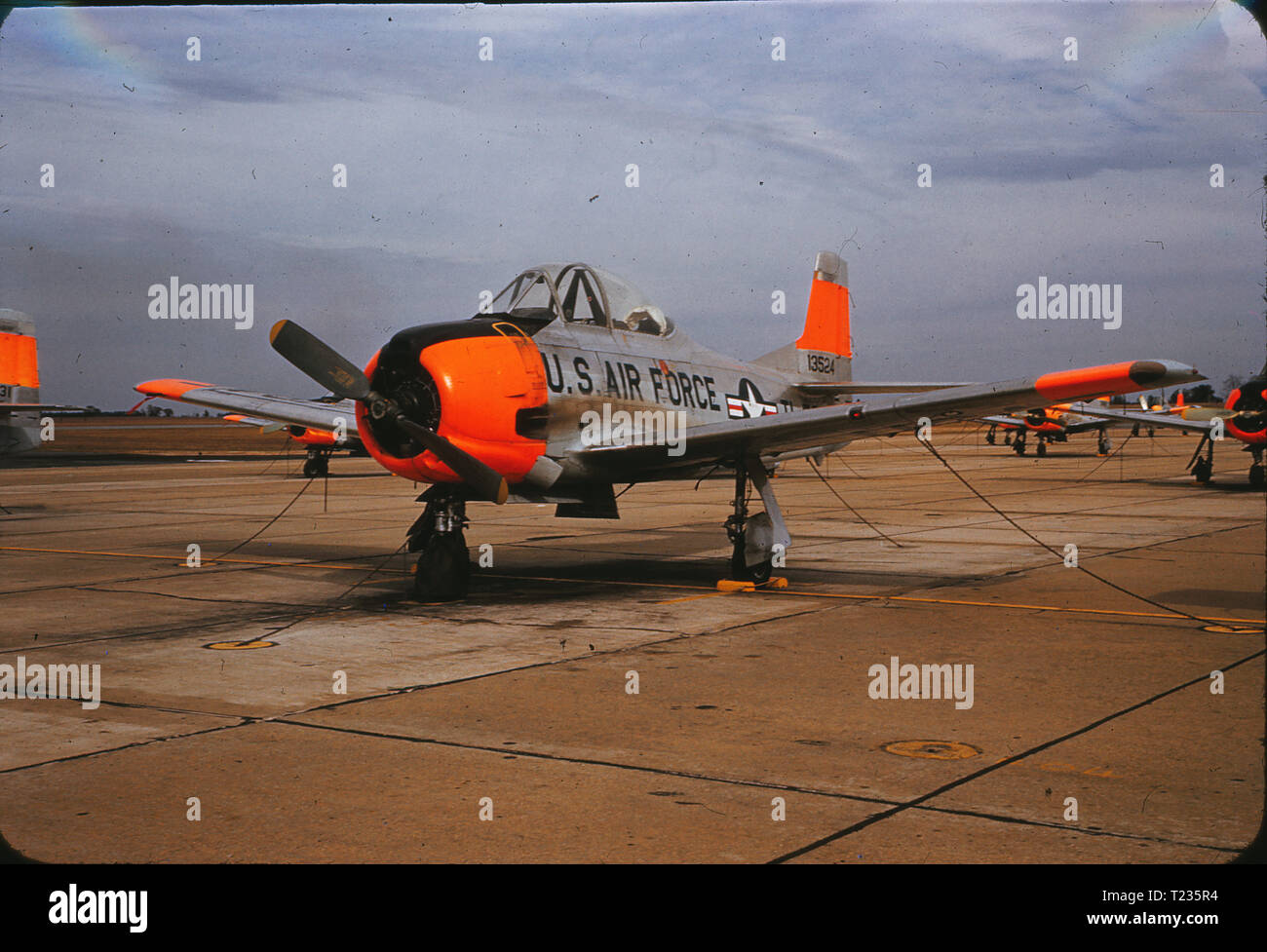 A North American T-28 Trojan parked at Spence Air Base in February 1959. Spence Air Base in Moultrie, GA was used as a US Air Force private contractor operated fight training school from 1951 to 1961, when the field was returned to civilian control. Stock Photo