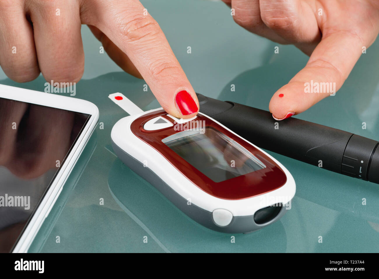 Blood Sugar Testing at home Stock Photo Alamy