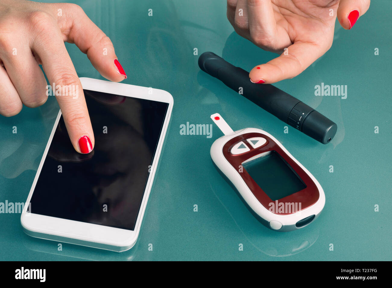 Using Blood Glucose Meter and Smart Phone Stock Photo Alamy