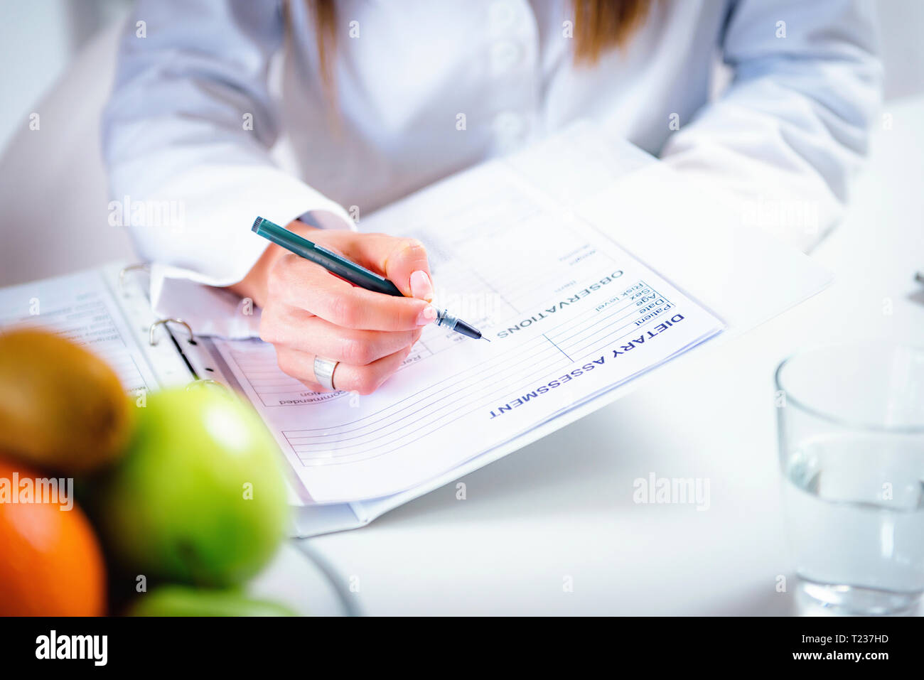 Nutritionist with female patient. Stock Photo