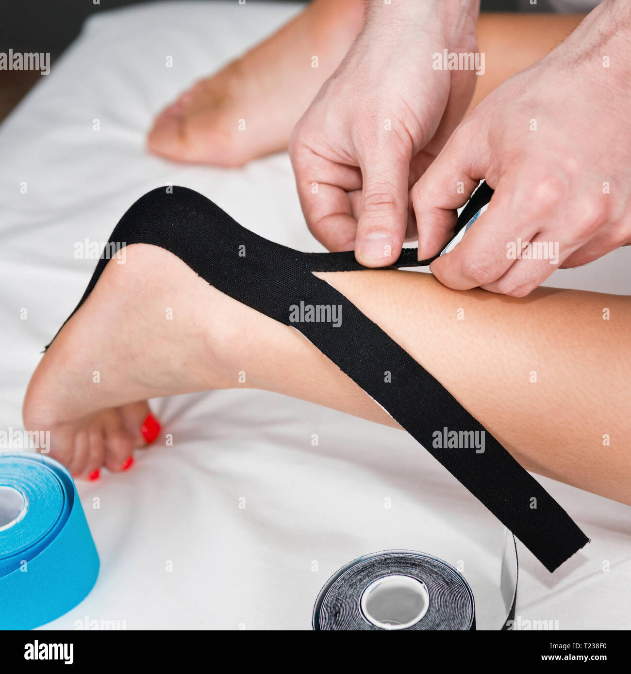 Taping treatment in physical therapy Stock Photo Alamy