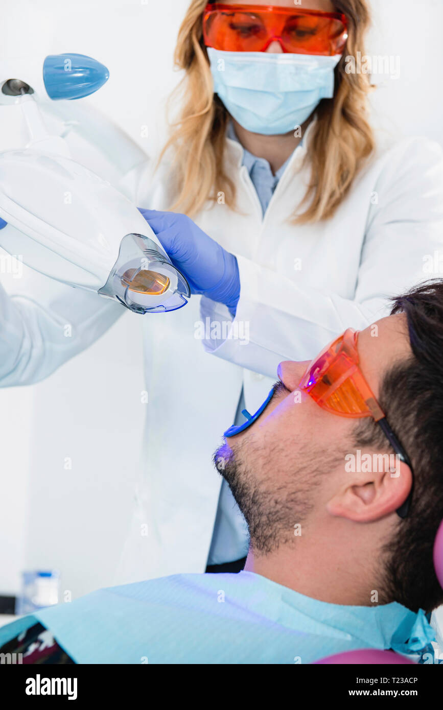 Laser teeth whitening procedure Stock Photo Alamy