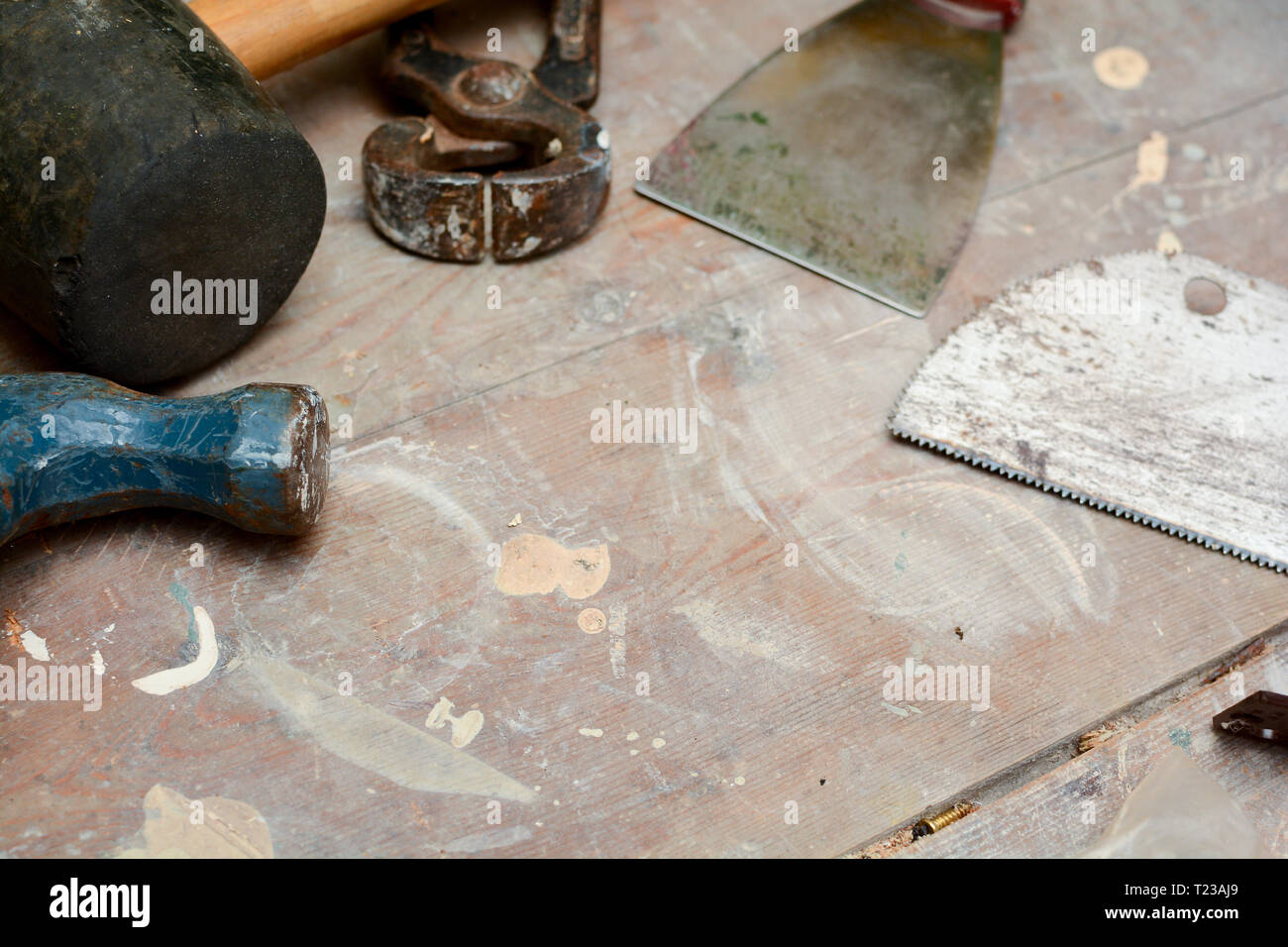 DIY work tools, used tools on a work bench Stock Photo