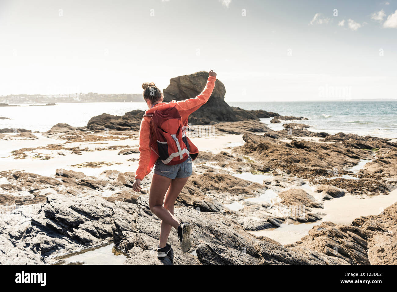 Woman rocky beach hi-res stock photography and images - Alamy
