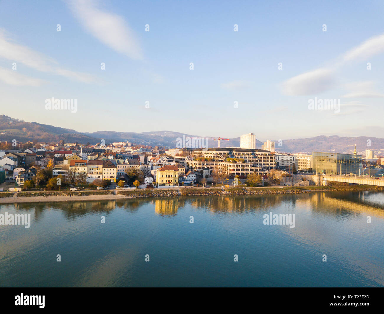 Austria, Linz, view to the city with Danube River in the foreground Stock Photo