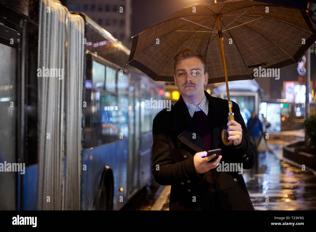 Man Umbrella Bus High Resolution Stock Photography and Images - Alamy