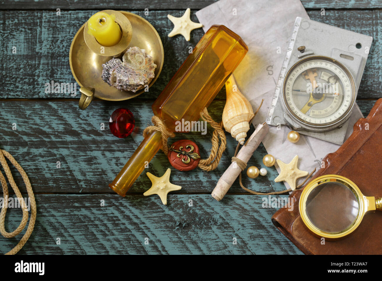 adventure and treasure hunt concept on wooden background Stock Photo - Alamy