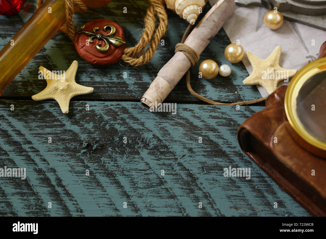 adventure and treasure hunt concept on wooden background Stock Photo - Alamy