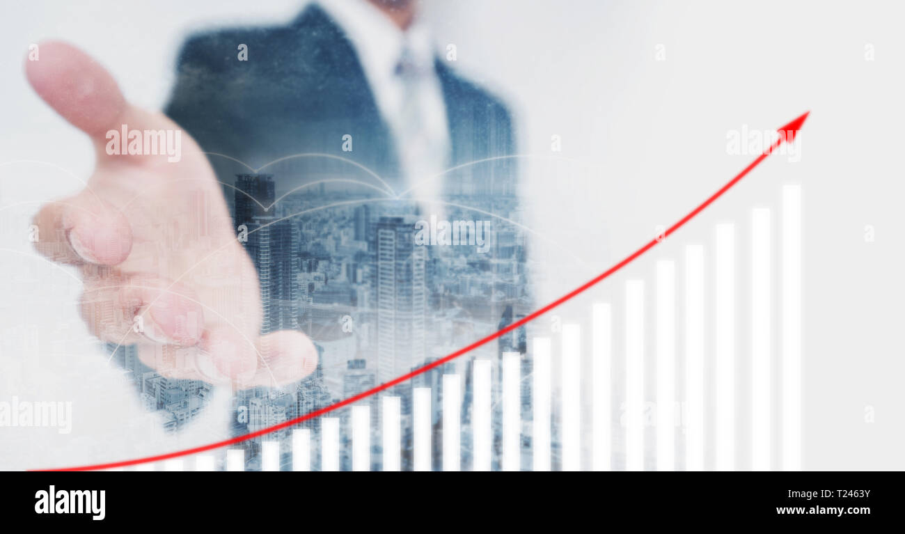 Business investor extending hand, showing increasing financial graph. Business growth and investment Stock Photo