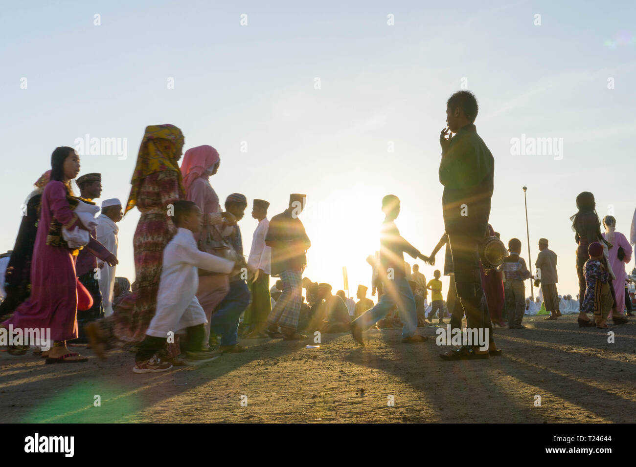 People go to harbour to do sholat in the morning at Eid Mubarak Day Stock Photo