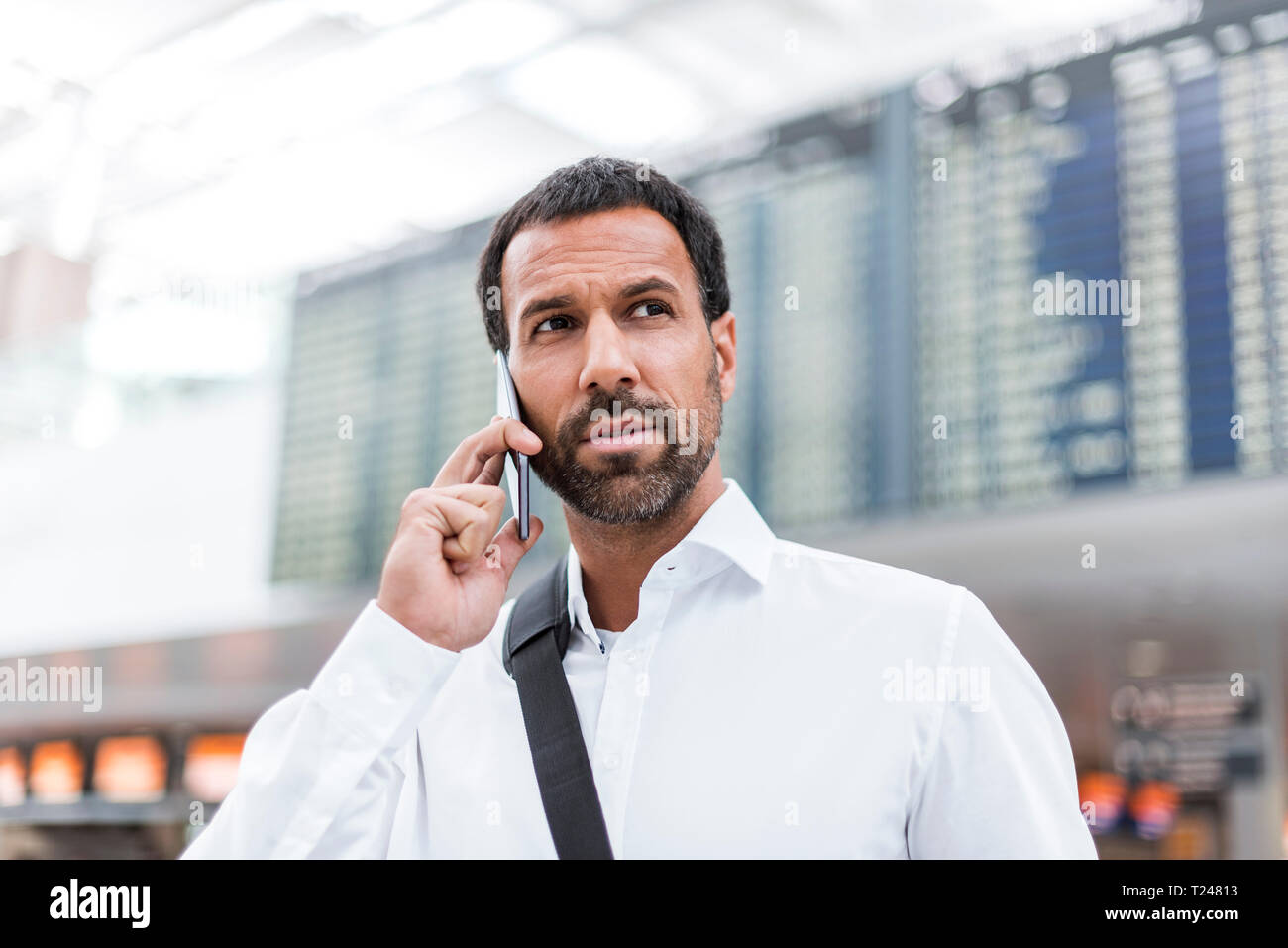 Businessman using smartphone Stock Photo