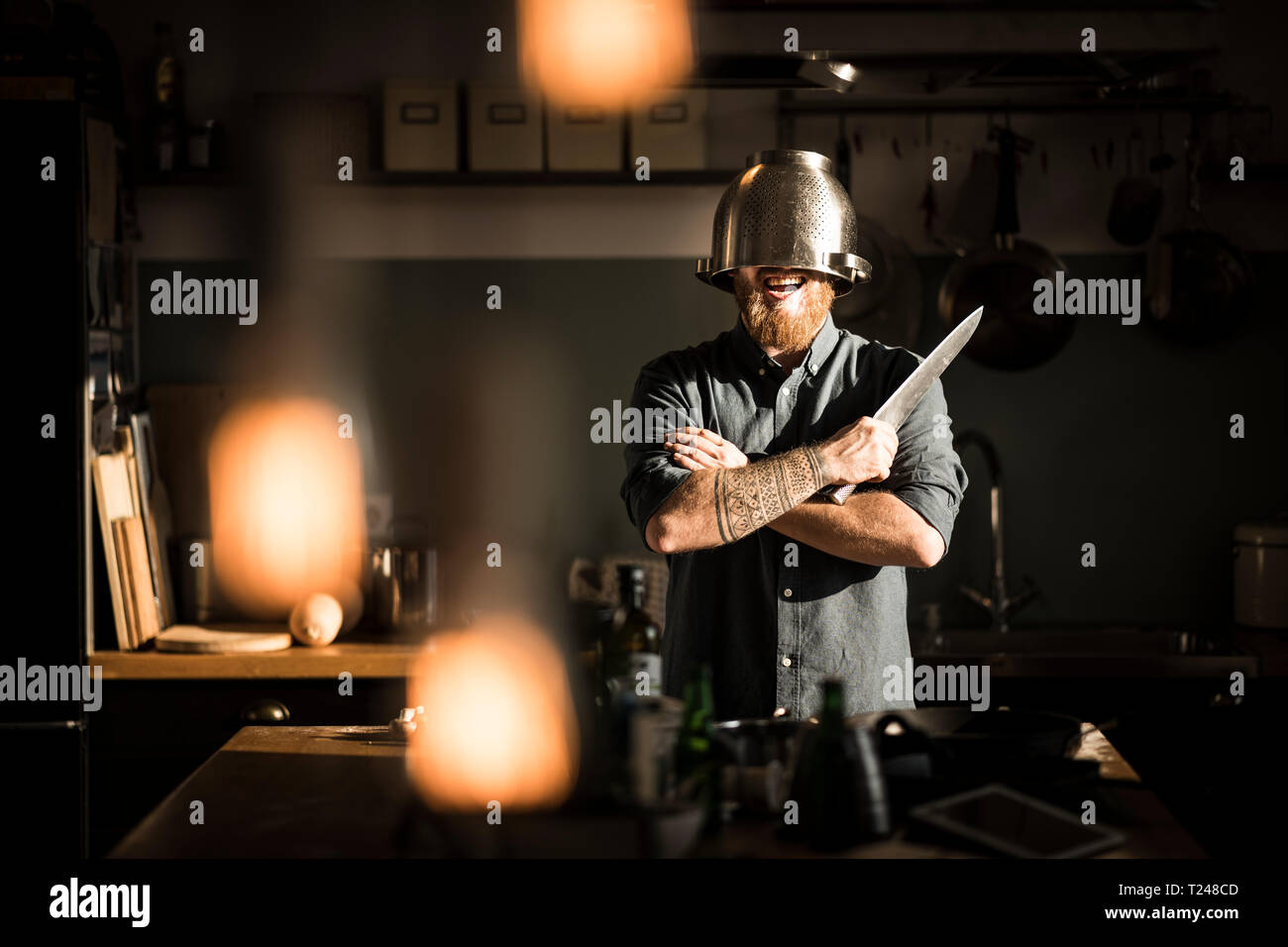 Wearing colander as helmet hires stock photography and images Alamy