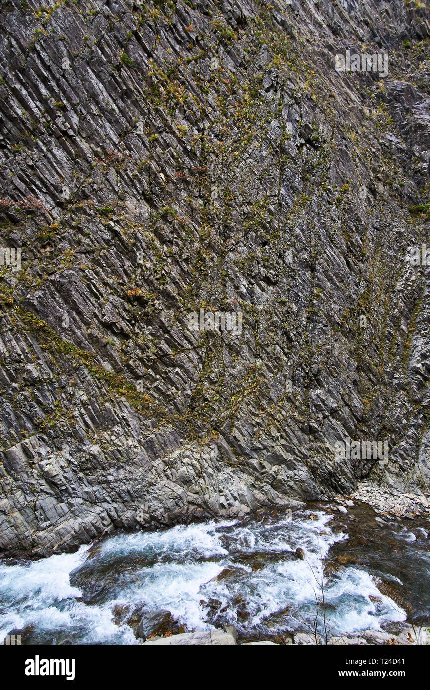 Interesting rock formations form the cliff faces of Kiyotsu Gorge (Canyon) in rural Nakasato, Niigata, Japan. Stock Photo