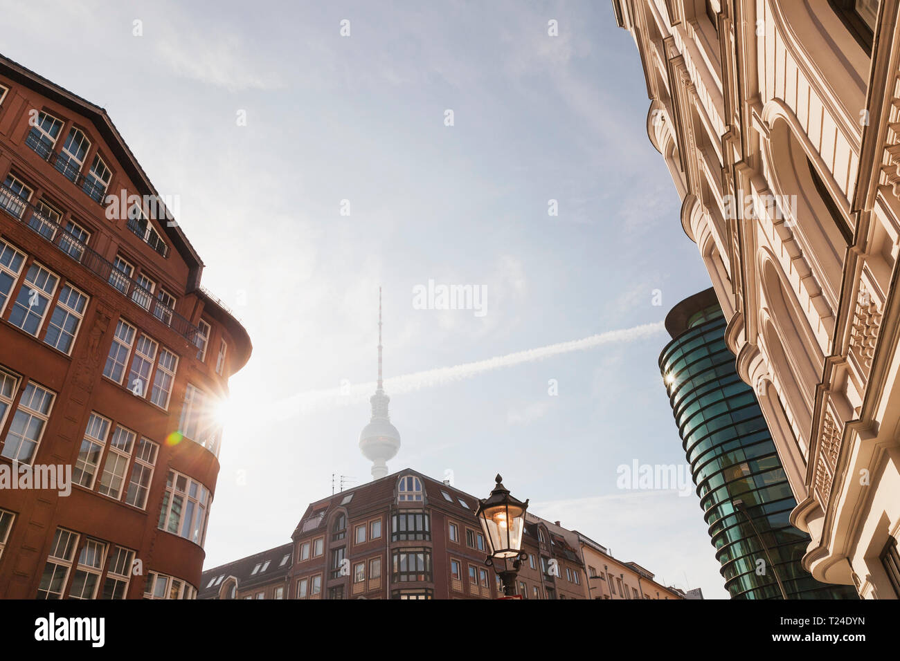Germany, Berlin, buildings at Rosenthaler Strasse with television tower in the background at morning Stock Photo