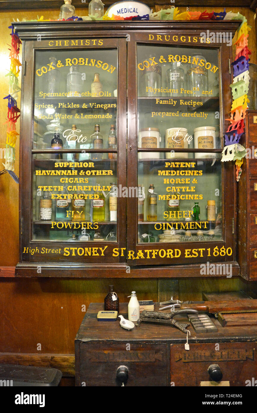 Cabinet in the Victorian Pharmacy. The Victorian village inside Milton Keynes Museum, Wolverton and Greenleys, in Milton Keynes, Buckinghamshire, UK Stock Photo