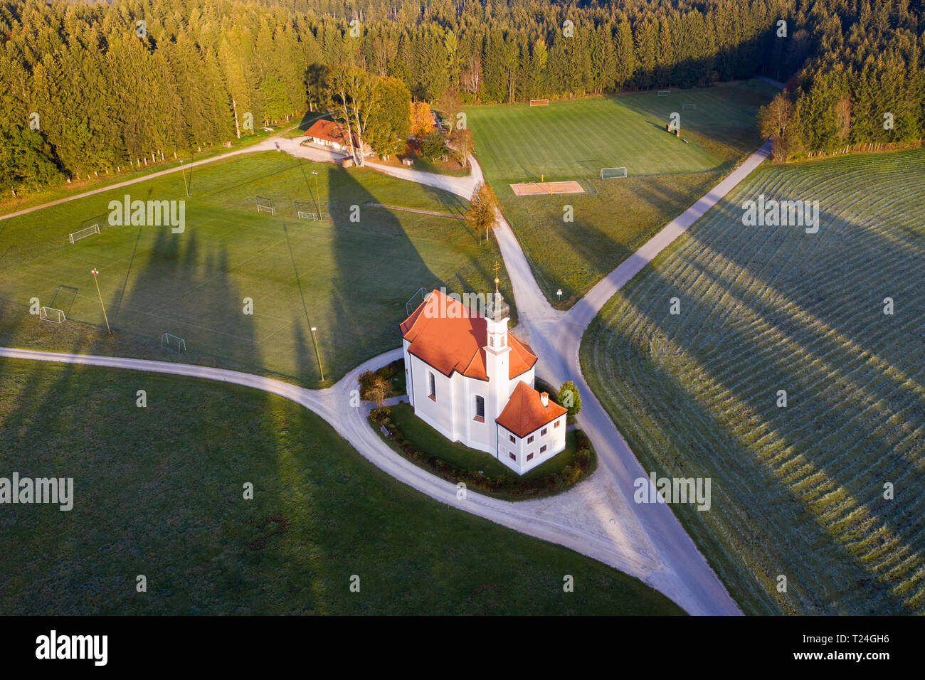 Germany, Bavaria, St. Leonhard church near Dietramszell, drone view Stock Photo