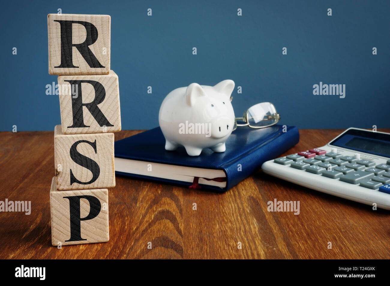 Registered retirement savings plan RRSP or RSP and piggy bank. Stock Photo