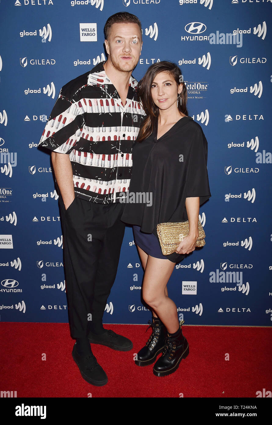 BEVERLY HILLS, CA - MARCH 28: Dan Reynolds (L) and Aja Volkman attend the 30th Annual GLAAD Media Awards at The Beverly Hilton Hotel on March 28, 2019 in Beverly Hills, California. Stock Photo