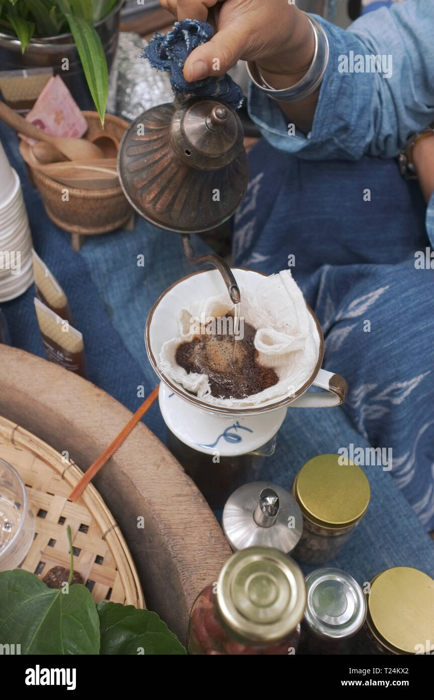 The woman making a Brew rice tea . THAI TEA Stock Photo