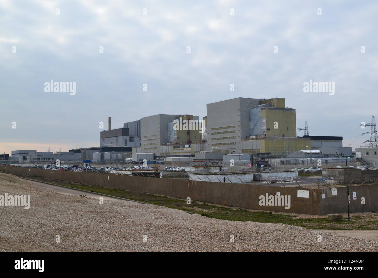 Dungeness A nuclear power station, decommissioned in 2006. The facility sits behind the rare and ecologlically valuable shingle banks Stock Photo