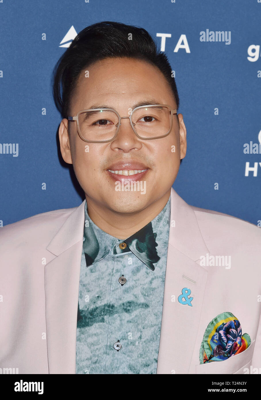 BEVERLY HILLS, CA - MARCH 28: Nico Santos attends the 30th Annual GLAAD Media Awards at The Beverly Hilton Hotel on March 28, 2019 in Beverly Hills, California. Stock Photo
